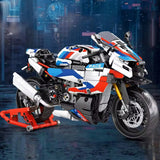Vue latérale de la Superbike M1000 RR en briques avec fourches dorées et béquille de stand rouge