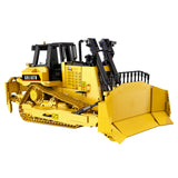 Vue de face bulldozer lourd en briques CaDA C61056