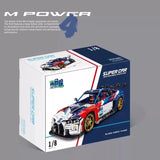 Boîte du kit BMW M4 GT3 Racing en briques 1:8 avec dimensions et visuel du modèle assemblé