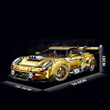 Porsche GT3 Gold Edition en briques 1:8 – portes ouvertes avec vue sur l'habitacle